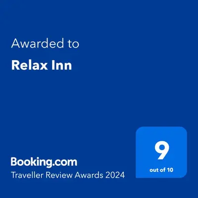 a screenshot of a phone with the text wanted to relax inn at Relax Inn in Liverpool