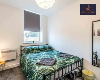 a bedroom with a bed and a window at Swan House Apartment 4 - 1 Bed Apartment - Sleeps up to 4 - Free Parking - Liverpool - close to city centre - By ALL ELITE STAYS in Liverpool