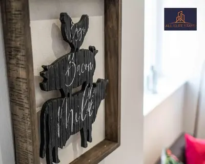 a mirror with a wooden sign in a room at Swan House Apartment 4 - 1 Bed Apartment - Sleeps up to 4 - Free Parking - Liverpool - close to city centre - By ALL ELITE STAYS in Liverpool