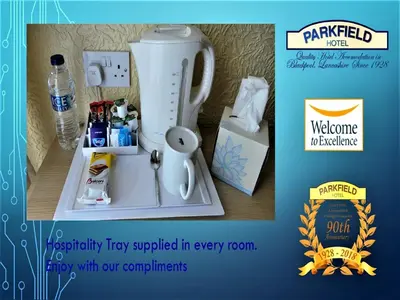 a white blender sitting on top of a table at Parkfield Hotel in Blackpool