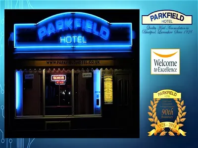 a sign on the front of a platte hotel at Parkfield Hotel in Blackpool