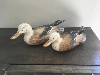 three rubber ducks sitting on top of a table at The Bungalow and Studio Apartments in Lytham St Annes