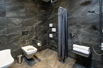 a bathroom with a toilet and a shower at The Borough Lancaster in Lancaster