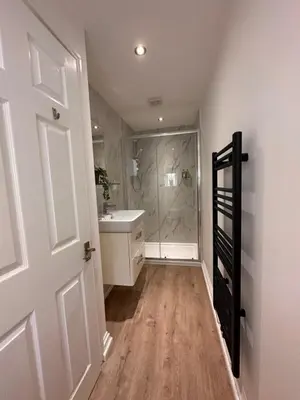 a bathroom with a shower and a sink at The Cottage in Saint Annes on the Sea