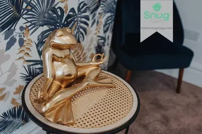 a statue of a frog sitting on a table next to a chair at Fairfield house - 4 bedroom, 8 beds, free Wi-Fi, free parking in Liverpool