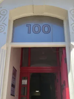 a door to a building with a sign above it at The Lumada in Blackpool