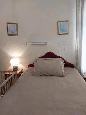 a bed with a pillow on it in a room at Lynwood Hotel & Spa in Blackpool