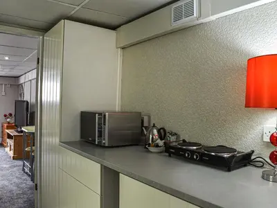 a kitchen with a counter top with a microwave at Apartment 786 At The Granville in Blackpool