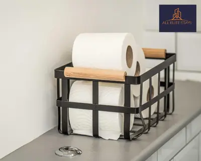 a shelf with rolls of toilet paper on a counter at Swan House Apartment 2 - 1 Bed Apartment - Sleeps up to 4 - Free Parking - Liverpool - close to city centre - By ALL ELITE STAYS in Liverpool