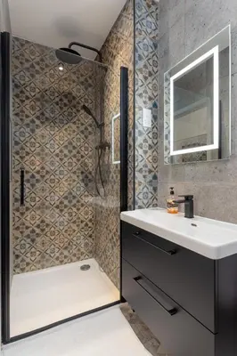 a bathroom with a shower with a sink and a shower at Flatzy - 16 Guests 4 En-suite Central Apartment B in Liverpool