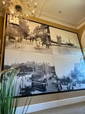 a large picture of a city on a wall at The New Talbot Hotel in Southport