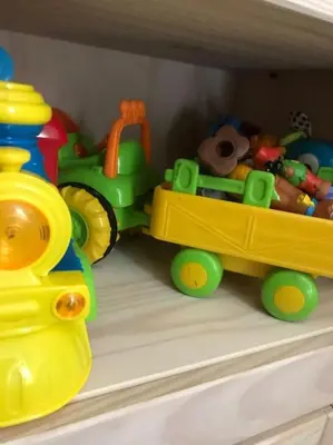 a toy train sitting on top of a shelf at Rural Family Farmhouse with Countryside views in Southport