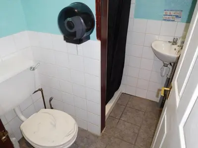a bathroom with a toilet and a sink at Bianca Guesthouse in Blackpool