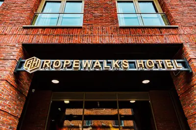 a brick building with a sign for a hotel at Ropewalks Hotel in Liverpool