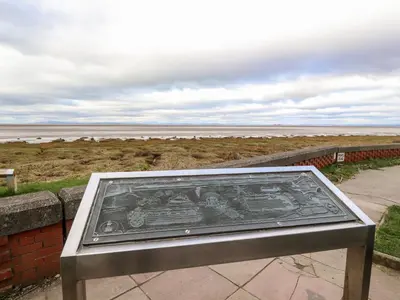a picture of a bench with a view of the beach at Flat 3, Sandridge Court in Fleetwood