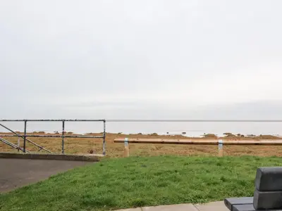 a room with a view of the ocean at Flat 3, Sandridge Court in Fleetwood