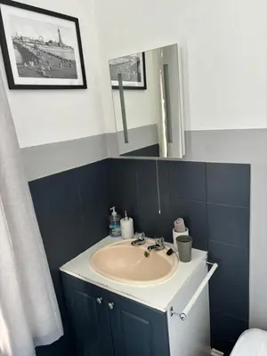 a bathroom with a sink and a mirror at Lee & Chris's Belvedere - Adults Only in Blackpool