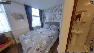 a small bedroom with a bed and a sink at Fairhaven Palentine Road in Blackpool