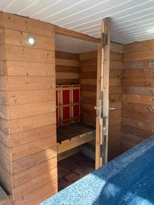 a wooden cabin with a sauna in it at Family Holiday Home in Blackpool