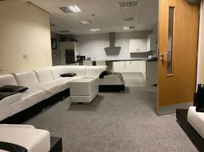 a living room with white couches in a room at ART APARTMENT in Fleetwood