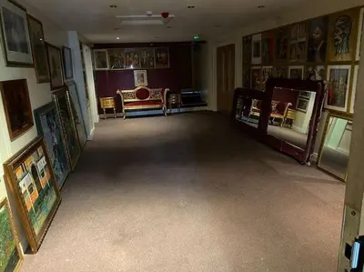 a room filled with paintings and pictures on the walls at ART APARTMENT in Fleetwood
