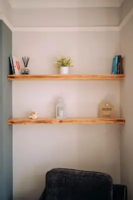 a room with wooden shelves on the wall at The Dunes, Lytham St Annes in Lytham St Annes