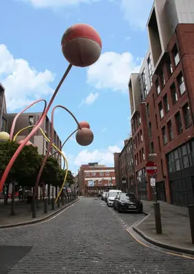 a street with a street light with a basketball on it at City Centre short & long stay apartment in Liverpool