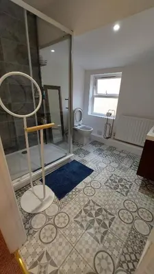 a bathroom with a shower and a toilet at Liverpool Newington Stay in Liverpool