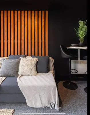 a living room with a couch and a table at One of Kind Boutique Pad in Liverpool