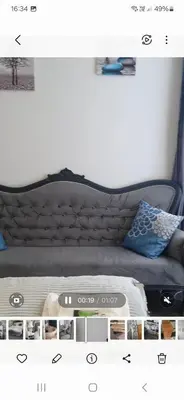 a bedroom with a bed with a black headboard at Rocklea Hotel in Blackpool