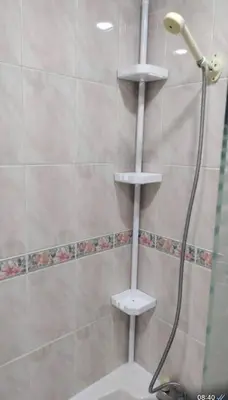 a shower with a shower head and a shower at Entire Immaculate 3 Bedrooms House in Blackburn Weekend Away in Blackburn