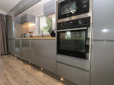 a kitchen with a stainless steel oven and a counter at Ruperts Retreat in Preston