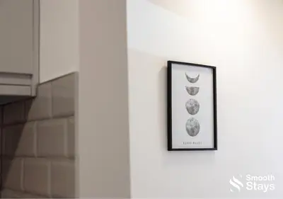 a framed picture of fruits on a wall at One Bedroom Apartment At Smooth Stays Short Lets & Serviced Accommodation Preston With Parking Near Train Station in Preston
