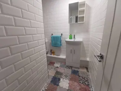 a bathroom with a sink and a bath tub at 'The Love Nest' Apartment Liverpool, Netflix in Liverpool