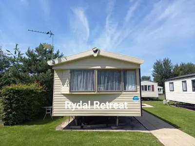 a typical retreat sign on the side of a house at Rydal Retreat Lakeland Holiday Park in Flookburgh