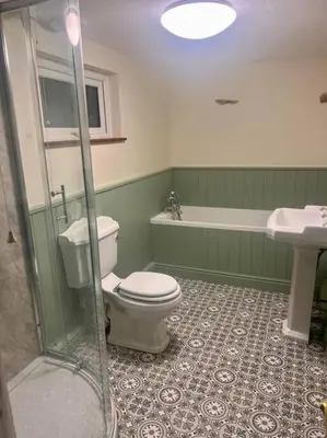 a bathroom with a toilet and a shower and a sink at Braffin @ Fellside Farm, Pennington, Ulverston in Pennington
