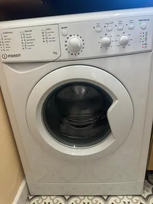 a white washing machine sitting in a room at Blackpool Rocks Pleasure Beach in Blackpool