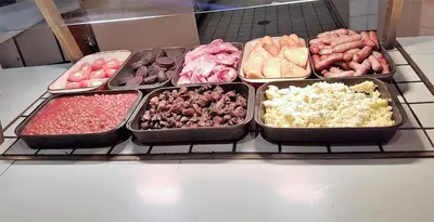 a bunch of trays of different types of food at Wigan Oak Hotel in Wigan