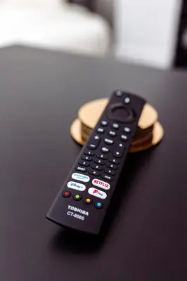 a remote control sitting on top of a table at Brown Ball in Barrow in Furness