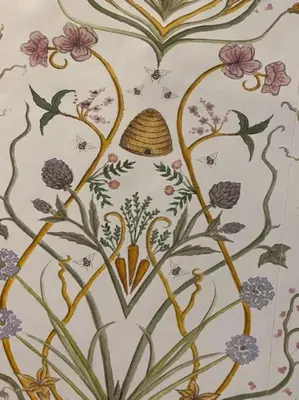 a wall with a painting of flowers on it at The flat at the crooked house in Ulverston