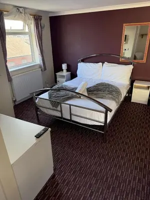 a bedroom with a bed in a room at Bronte House - Blackpool in Blackpool