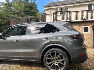 a silver car parked in front of a house at Fulwood House in Grimsargh