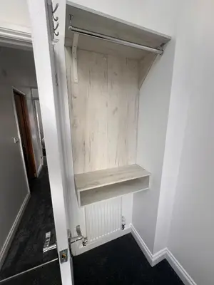 a room with a closet with a wooden door at The Annexe, St Andrews house hotel, Two bedrooms Sleeps 4 in Preston