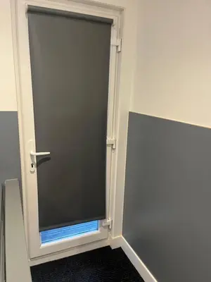 a door with a window in a room at Townsend lane accommodation in Liverpool