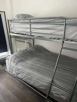 a couple of bunk beds in a room at Townsend lane accommodation in Liverpool