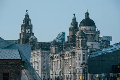 a large building with a clock tower on top of it at The Halyard Liverpool, Vignette Collection by IHG in Liverpool