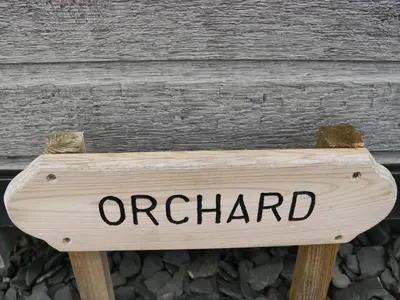 a sign that reads orland sitting in front of a building at Orchard in Dalton in Furness