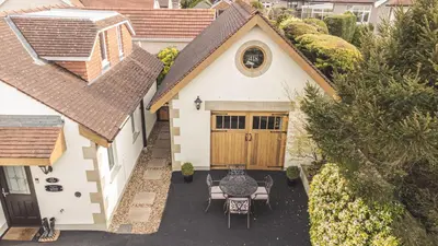 an aerial view of a house with a table and chairs at The Coach House Heysham in Heysham