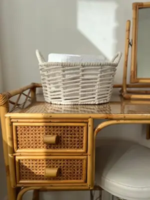 a basket on top of a table with a mirror at 2025 Award Winner Liverpool Cherry House - 4 Bedrooms in Liverpool