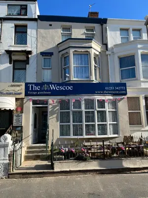 a building with a sign that reads the westrobe at The Wescoe Guesthouse in Blackpool